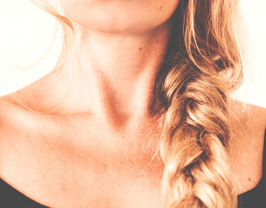 Woman's neck and hair close up